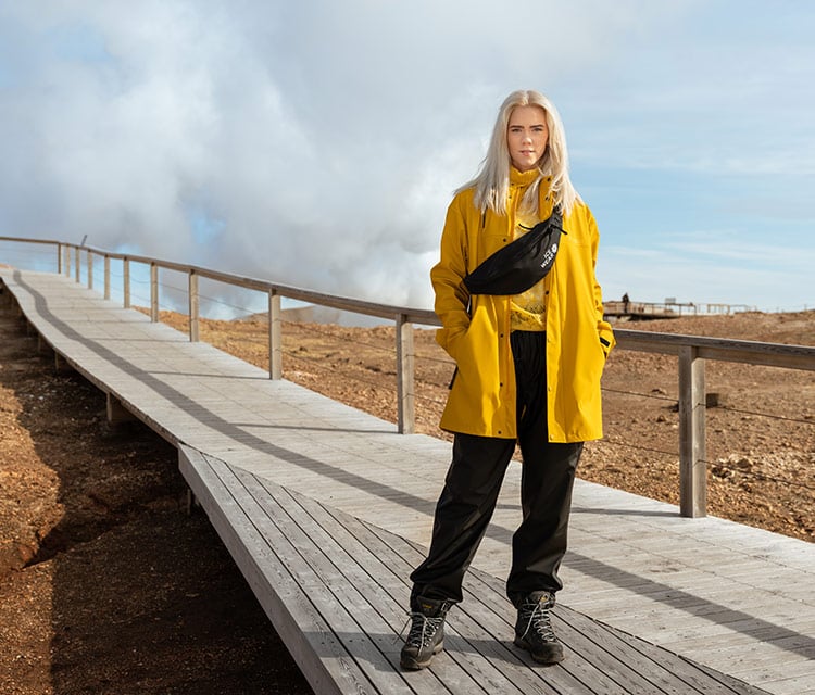 yellow classic raincoat Iceland woman